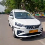 Indore Taxi Gallery featuring a clean white Ertiga taxi