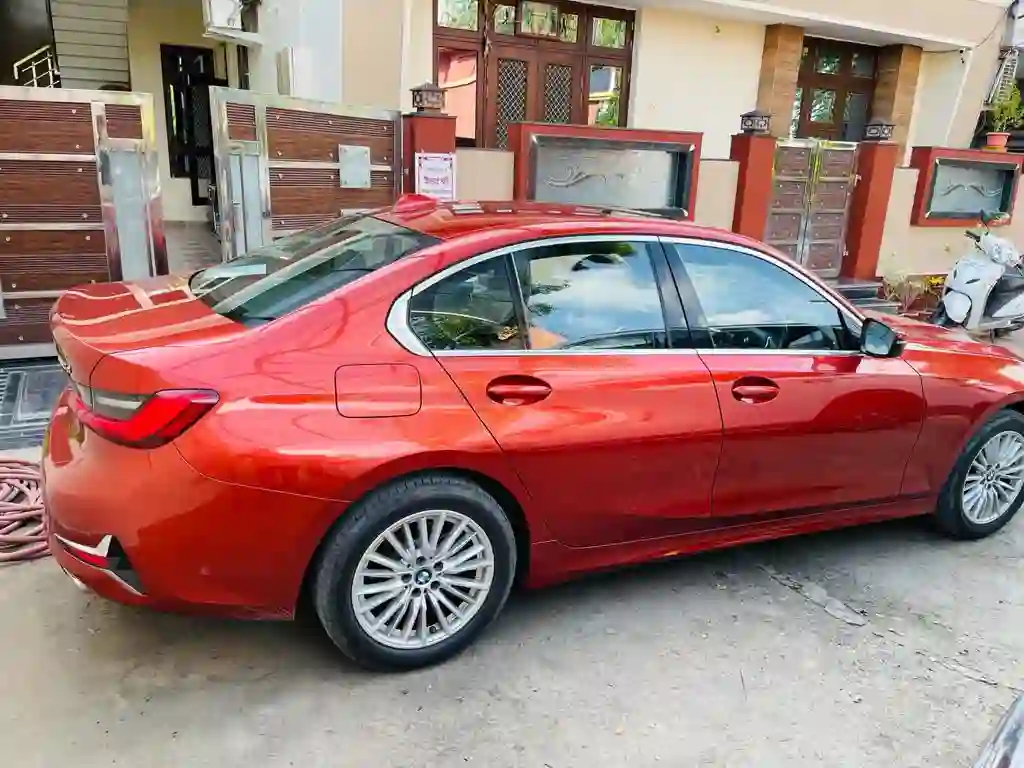 Car Rental in Indore with premium red sedan for comfortable travel