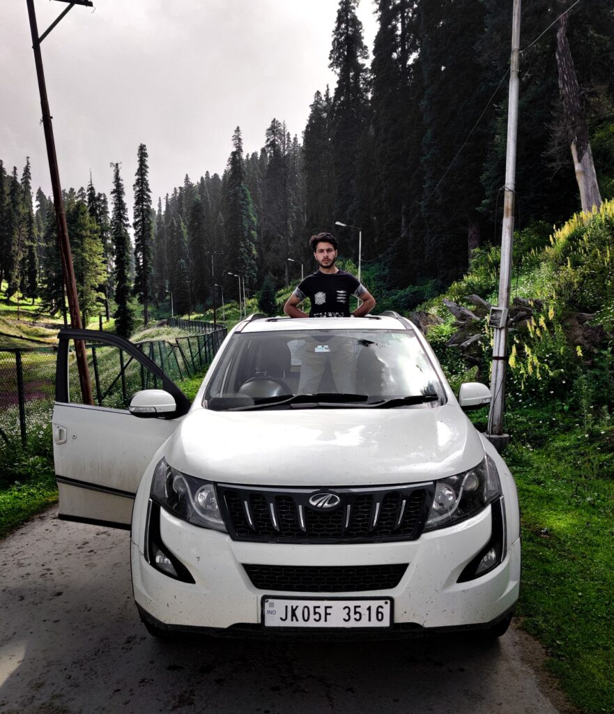 Book Indore to Omkareshwar Taxi with a traveler beside a comfortable cab